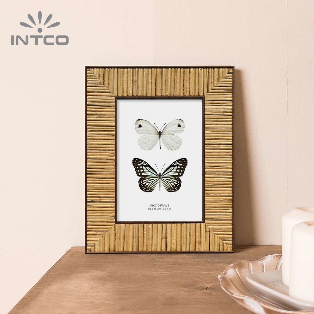 Intco rattan picture frame encases your favorite memories with natural warmth